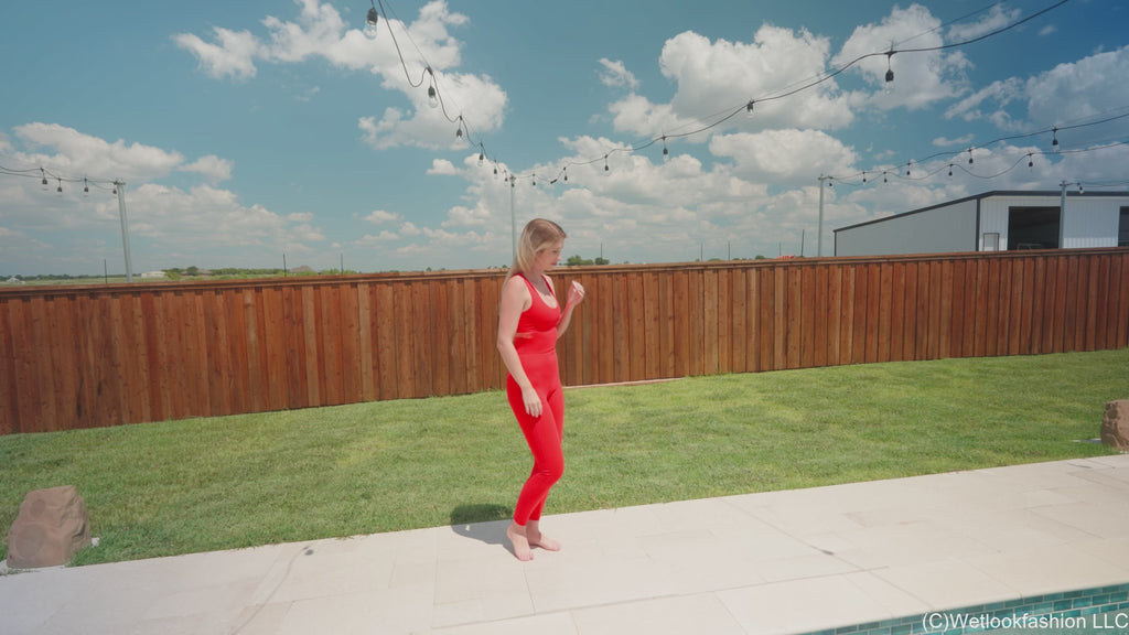 Kate Swims in a Red Jumpsuit
