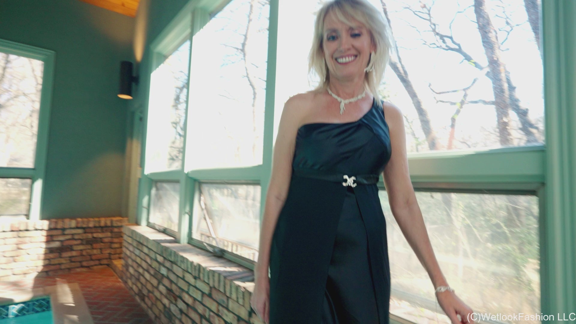 Angel Swimming in a Shiny Black Evening Gown