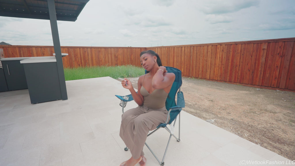 Naomi Is Smoking and Swimming in a Pantsuit