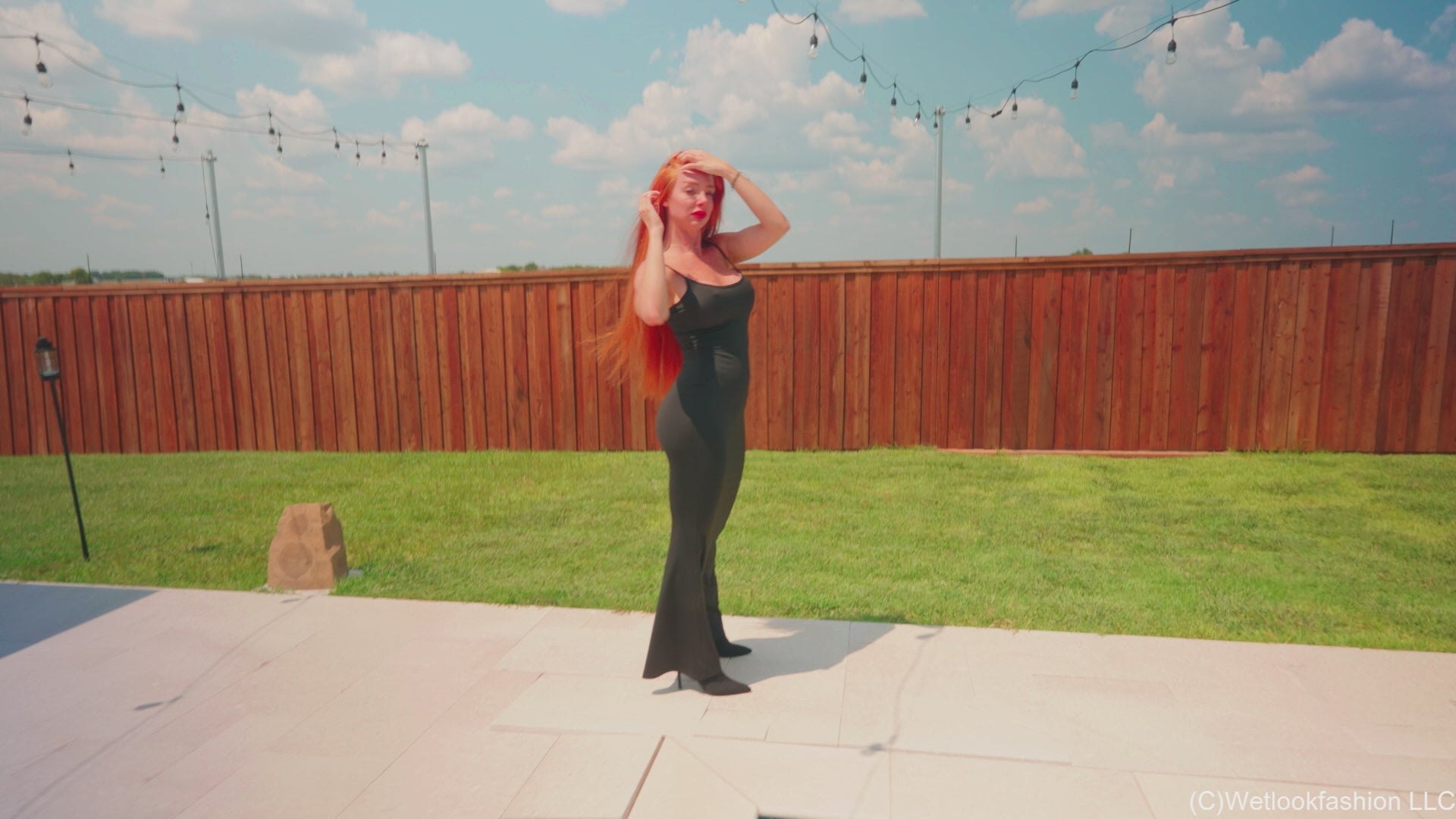 Krispeachi Swims in a Shiny Black Maxidress