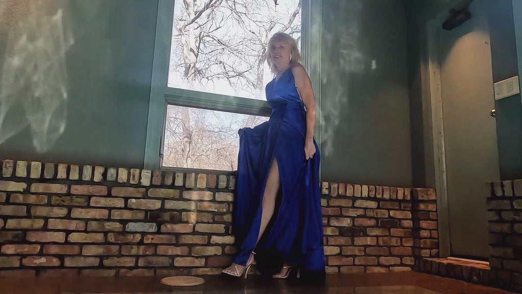 Angel Swims In Her Stunning Blue Evening Gown
