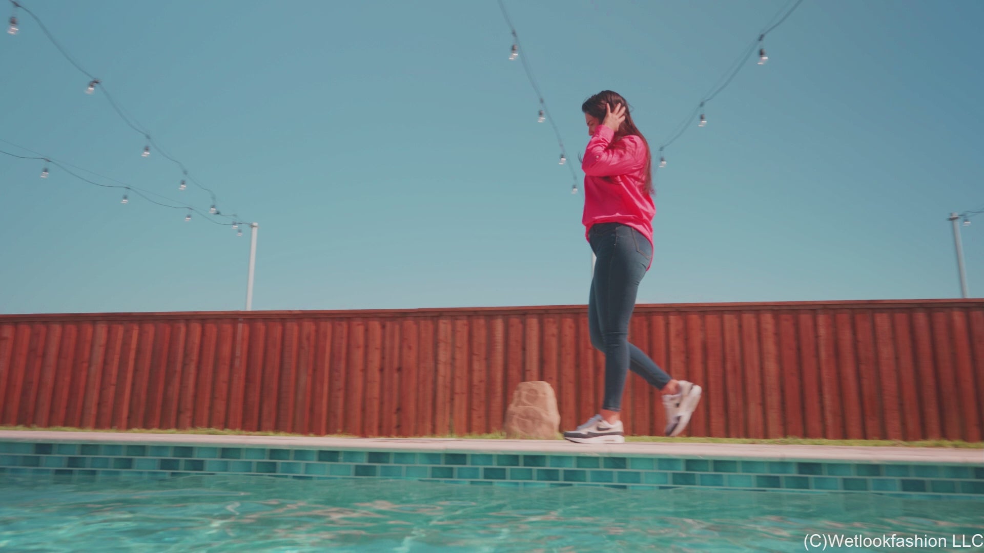 Alexandra Swims in Jeans, Sneakers, and a Button Up Shirt