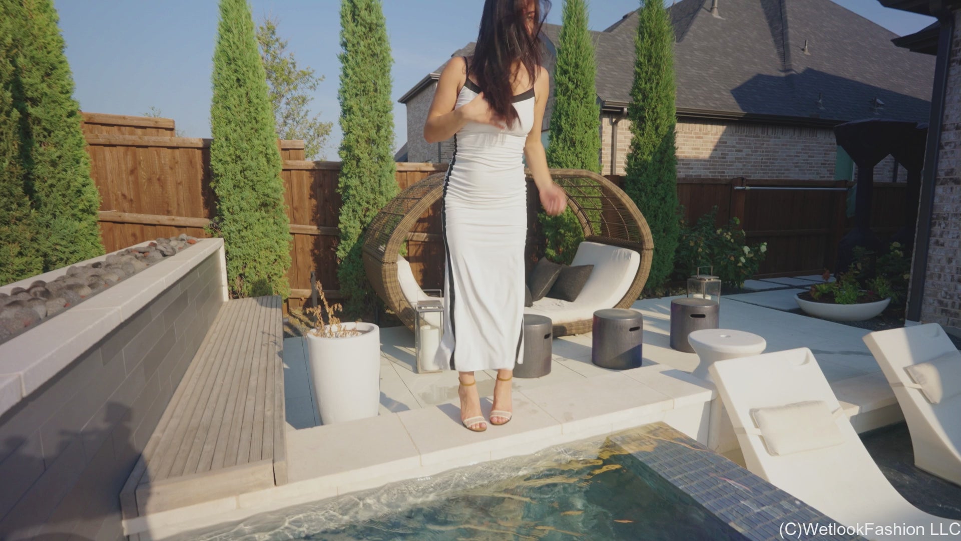 Kylie Soaks Her White Maxi Dress