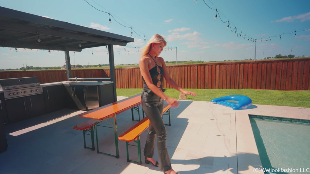 Katie Takes a Swim in Leather Pants and a Satin Top