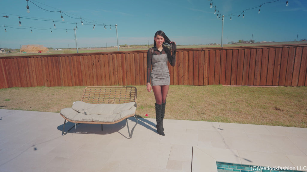 New Model Nicole Swims in a Hot Dress, Tights and Boots