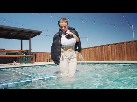 Presley Takes a Dip Wearing Pants, a Crop Top and a Jacket