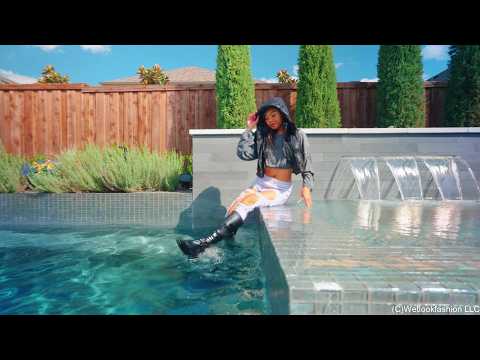 Christy Swims Wearing Jeans, Sweater, Boots and a Jacket