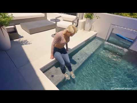 Natasha Gets Wet in a Casual Jeans Outfit