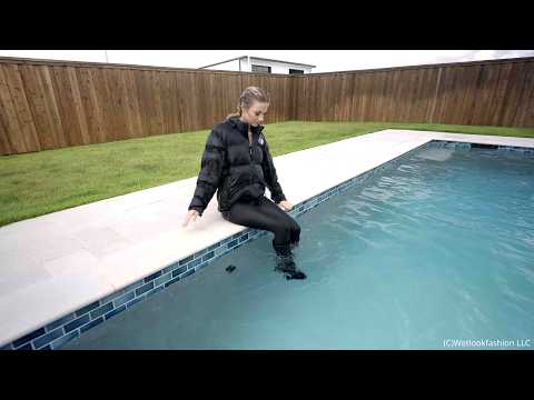 Izabella Goes for a Swim in a Jumpsuit, Jacket and Boots