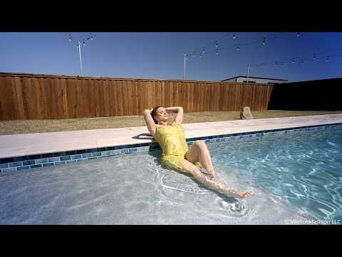 Presley takes a Swim in a Yellow Satin Dress