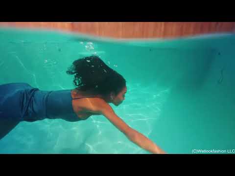 Amy Enjoys a Pool Dip in a Shiny Satin Dress