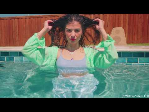 Carla Swims in White Jeans, Top and Shirt