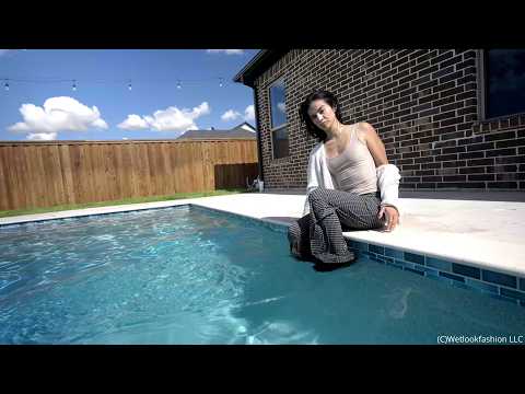 Carla Takes a Dip in the Pool Wearing a Casual Outfit