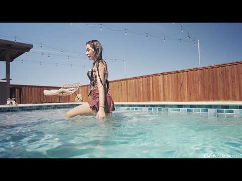 Nicole takes a Dip in a Mini Skirt and a Floral Top