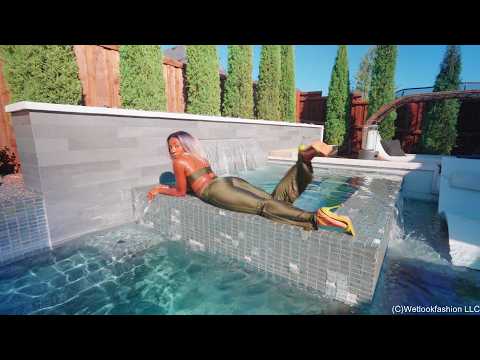 Naomi Swims in a Shiny Lucky Green Outfit