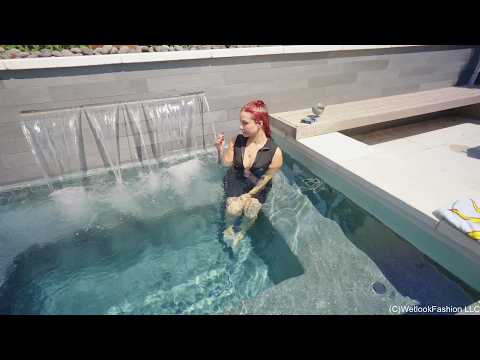 Scarlett Has a Smoke in the Hot Tub While Fully Clothed
