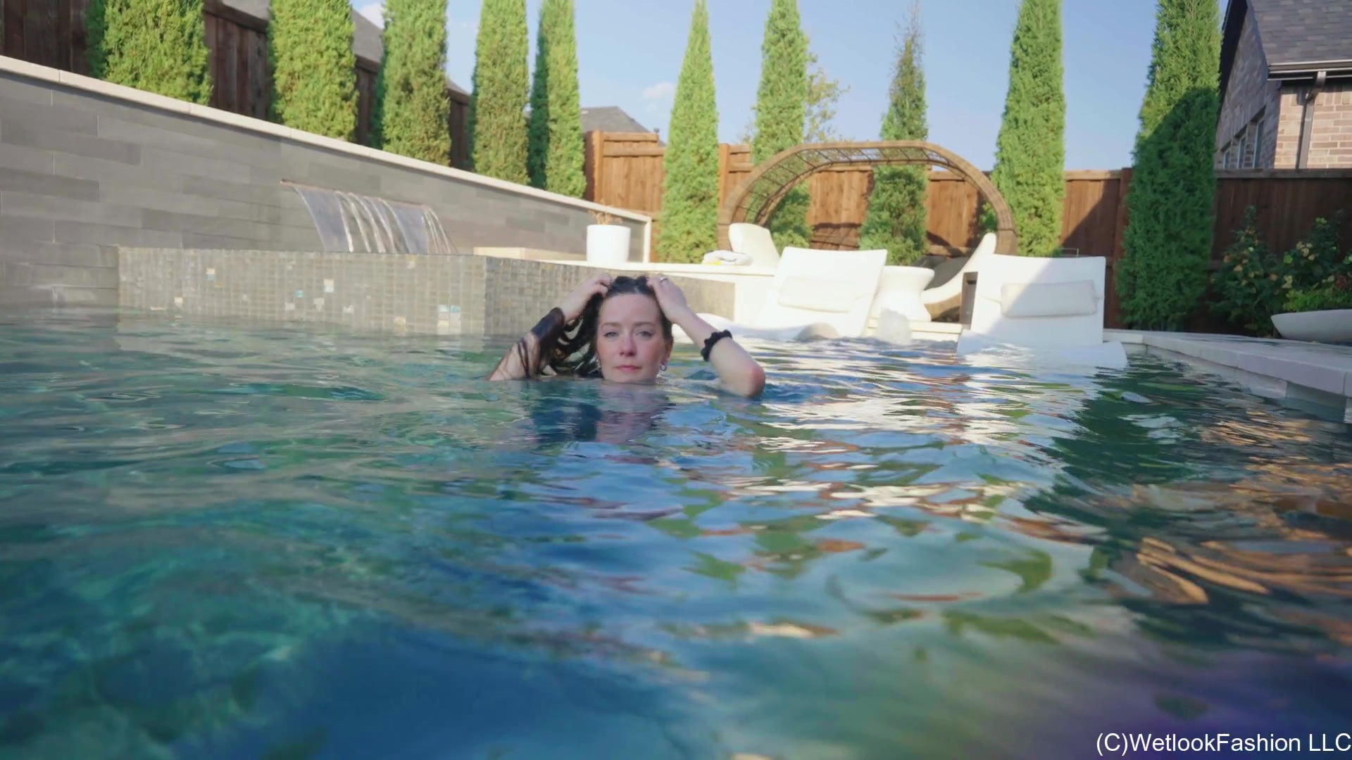 Rey Goes for a Swim in Levi's, White Top and Flip Flops