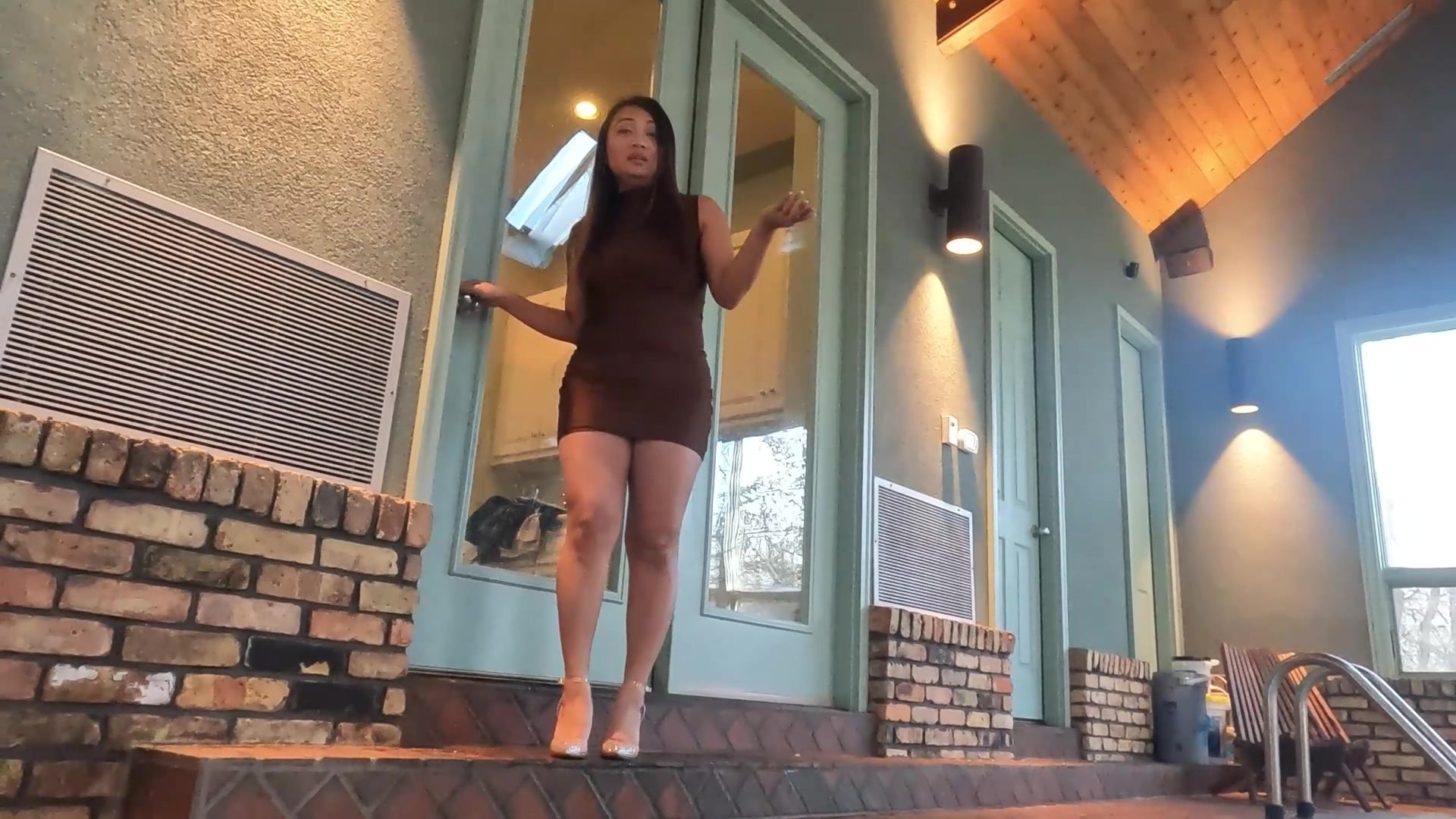 Reyna Jumps in the Pool in Her Clubbing Outfit