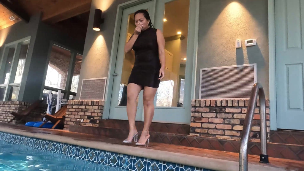Reyna Jumps in the Pool in Her Clubbing Outfit