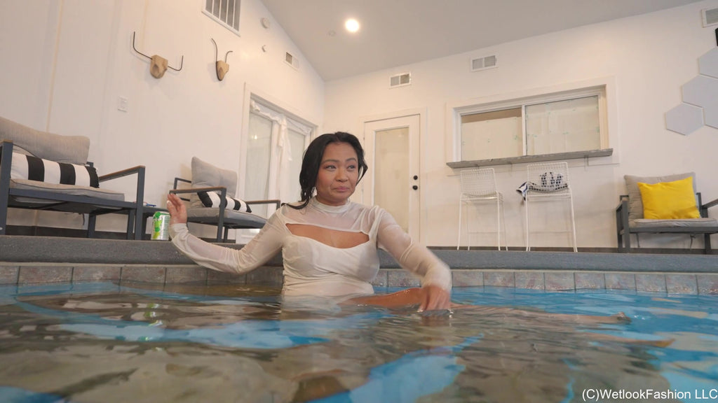 Reyna Swimming in a White Dress