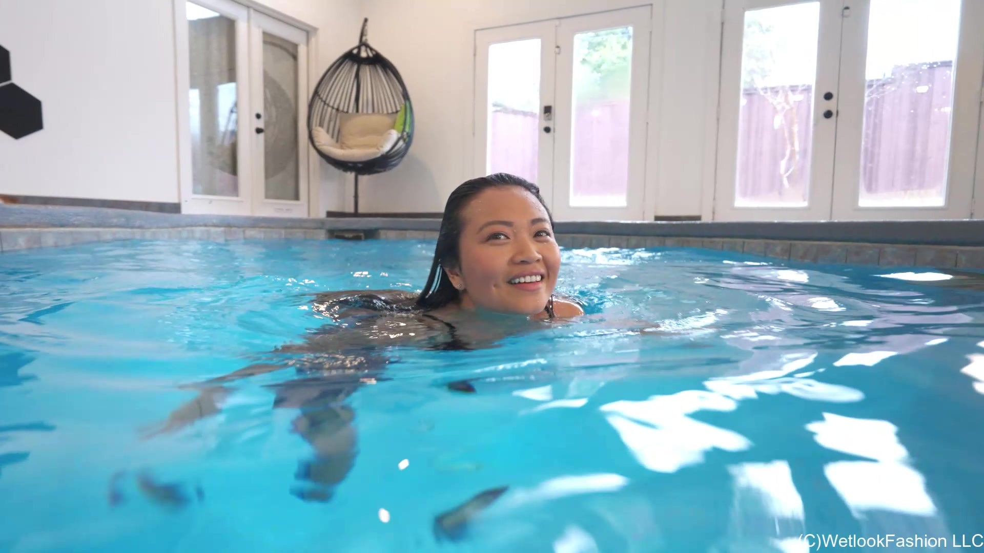 Reyna Swimming in the Pool in Jeans, Heels and a Swimsuit