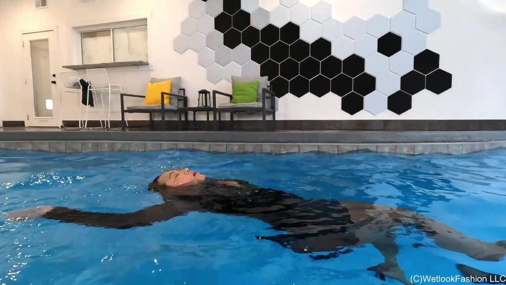 Reyna Swims in a Little Black Dress