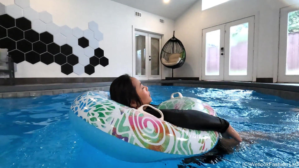 Reyna Swims in a Little Black Dress