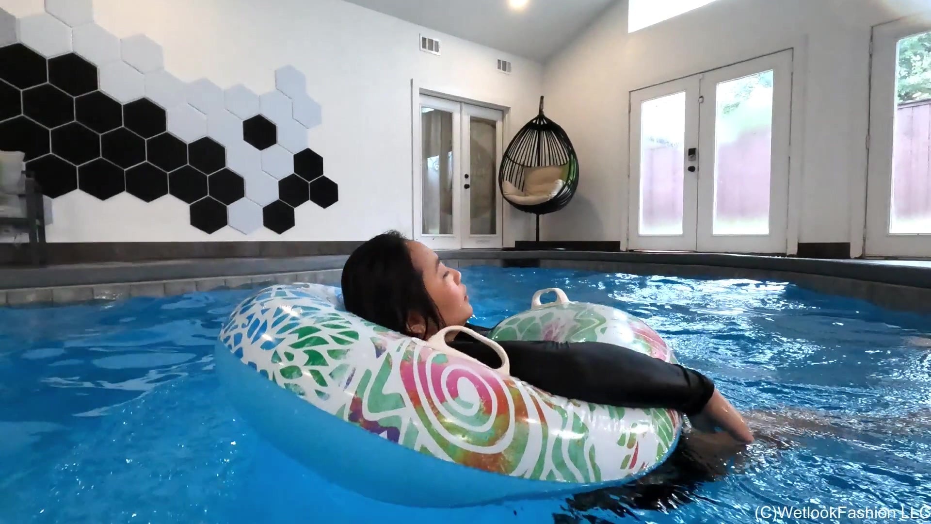 Reyna Swims in a Little Black Dress