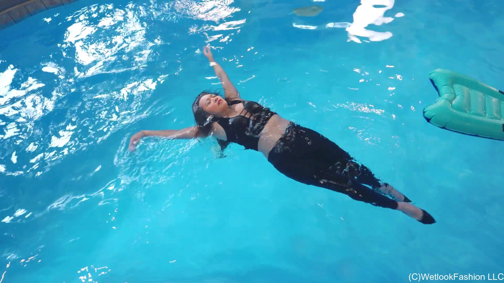 Reyna Swims in Leather Leggings, Top and Heels