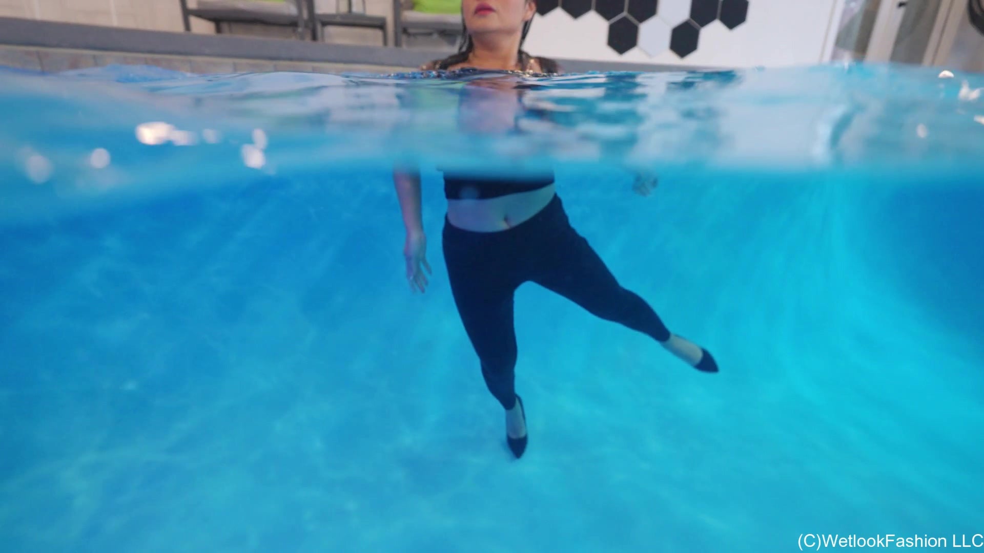 Reyna Swims in Leather Leggings, Top and Heels