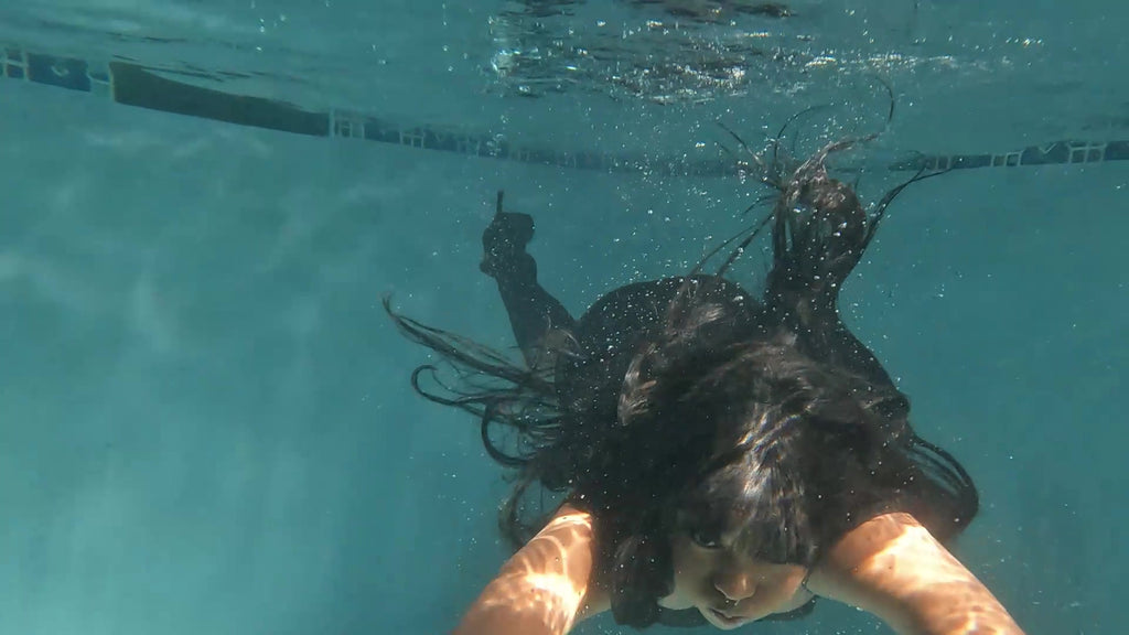 Rose Goes for a Swim in Her Leather Skirt and Top