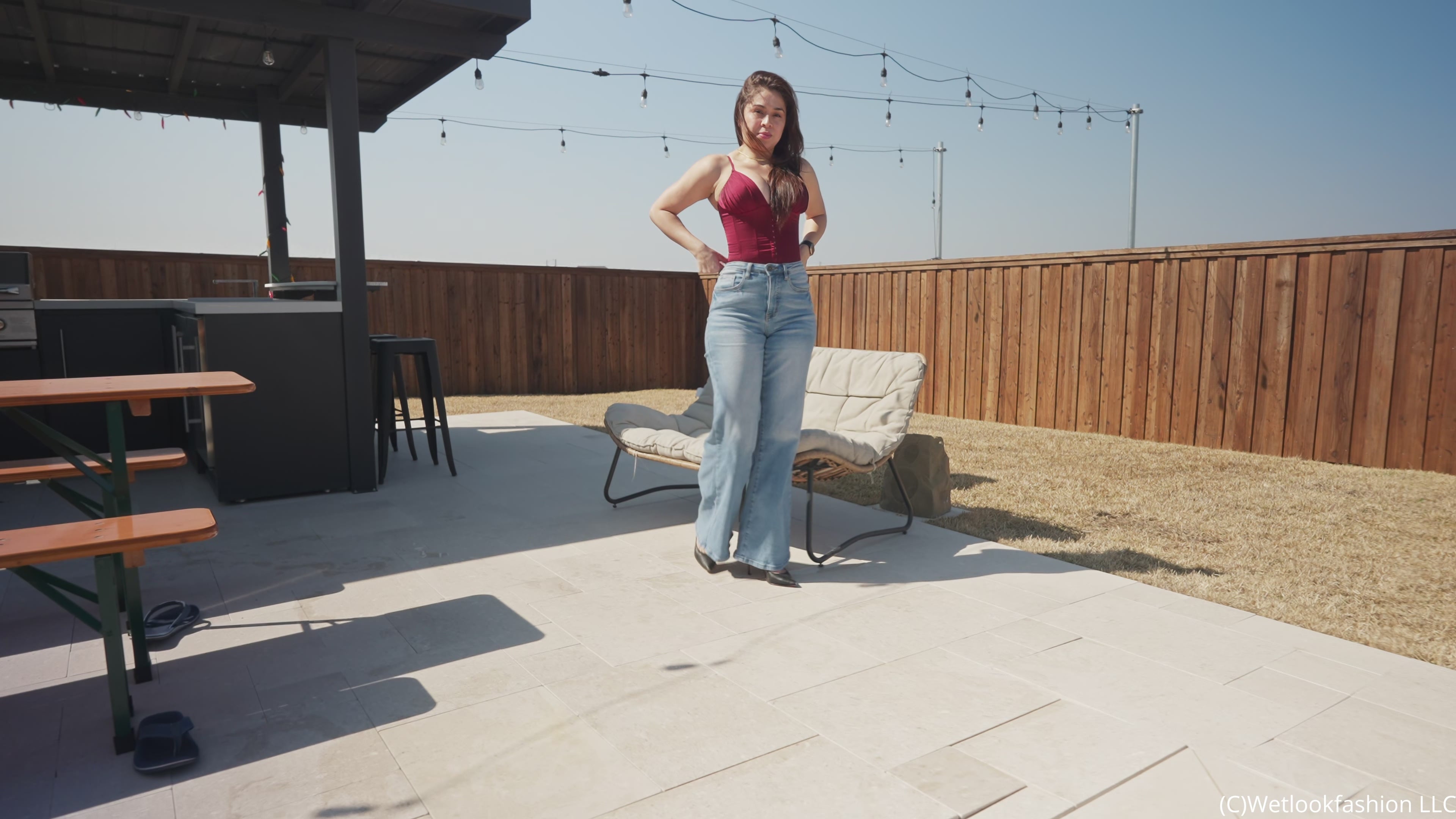 Samantha Dives in the Pool Wearing Jeans and a Red Corset
