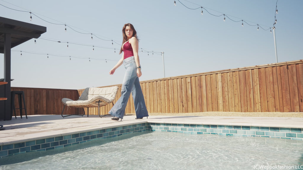 Samantha Dives in the Pool Wearing Jeans and a Red Corset