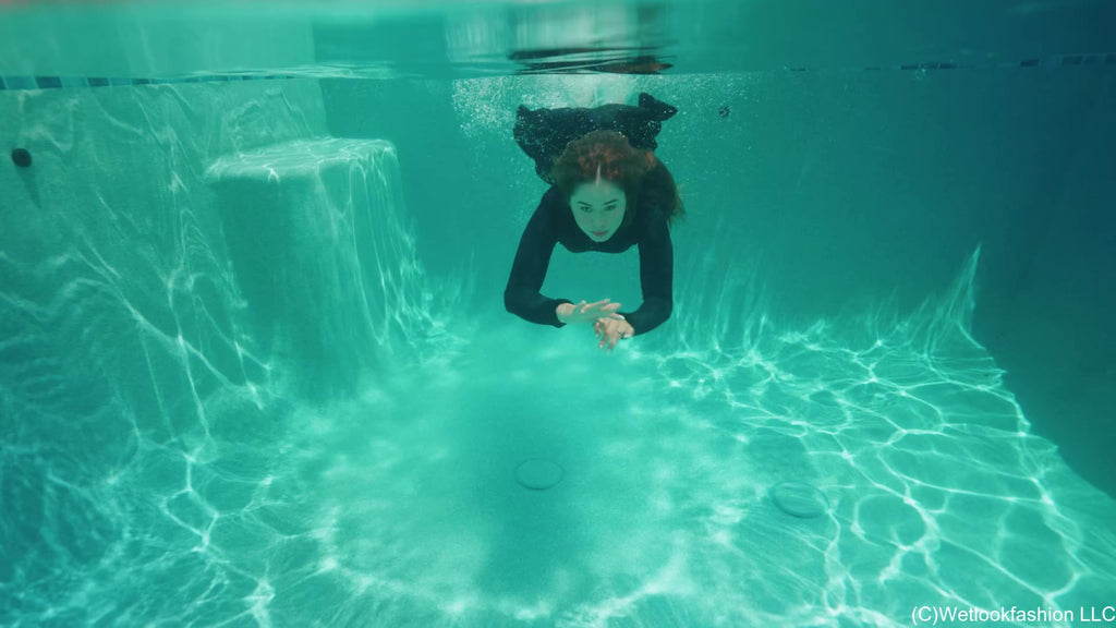 Samantha Takes a Barefoot Swim in a Sporty Skirt Outfit