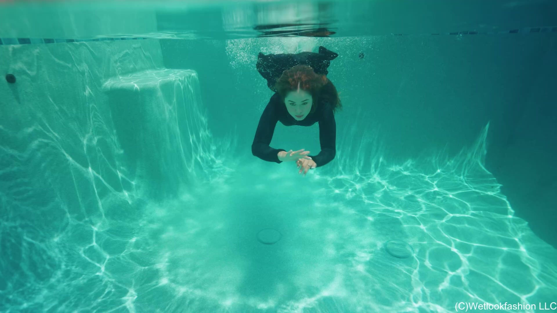 Samantha Takes a Barefoot Swim in a Sporty Skirt Outfit