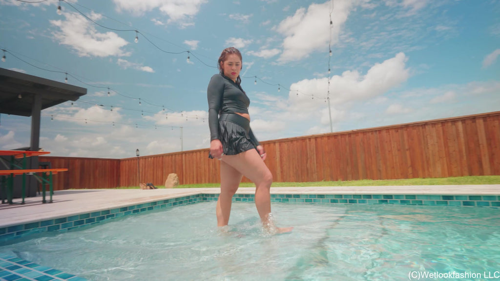 Samantha Takes a Barefoot Swim in a Sporty Skirt Outfit