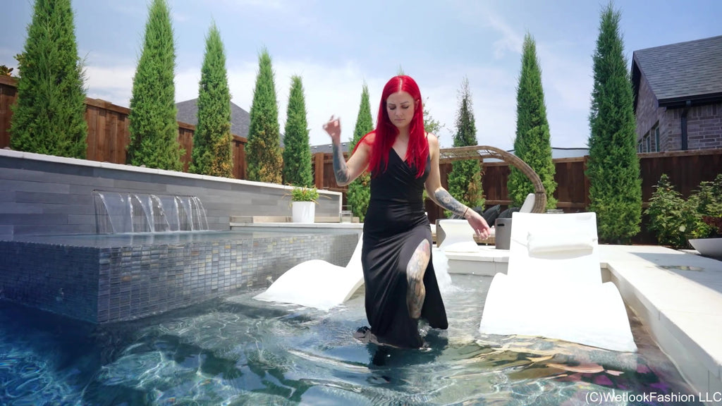 Scarlet Goes for a Swim in a Long Black Dress and Boots