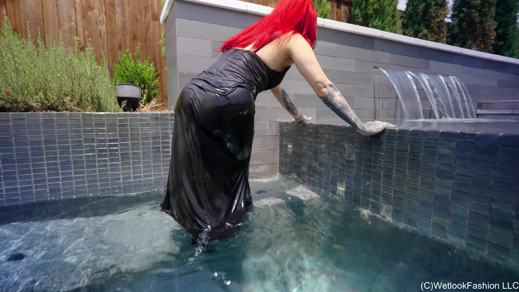 Scarlet Goes for a Swim in a Long Black Dress and Boots