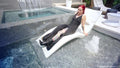 Scarlet Goes for a Swim in a Long Black Dress and Boots
