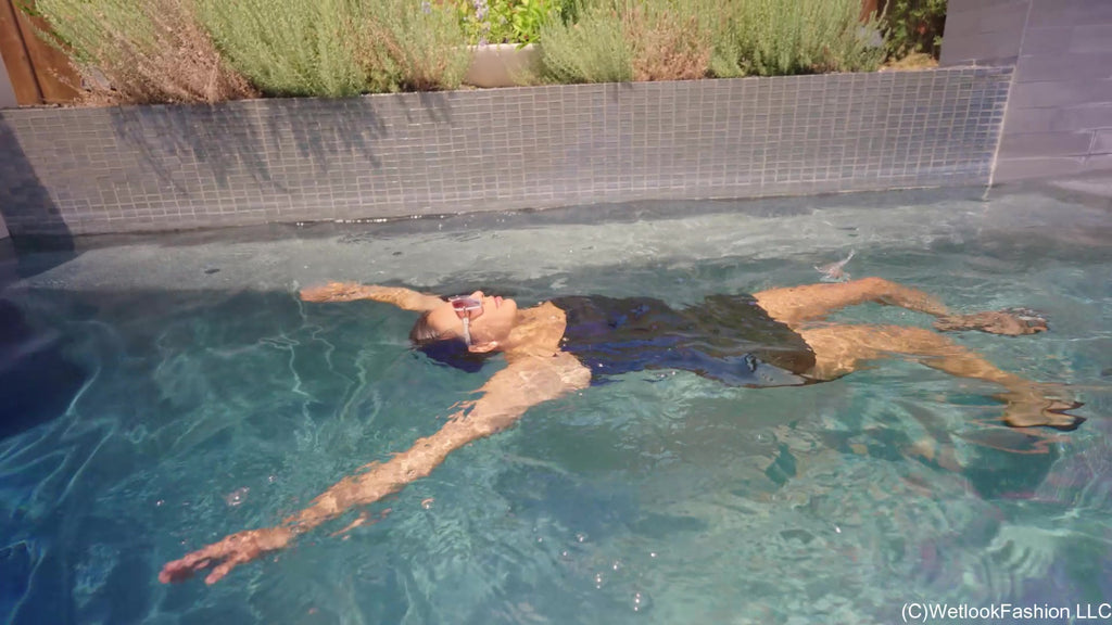 Selina Gets in the Pool a  Little Black Satin Dress