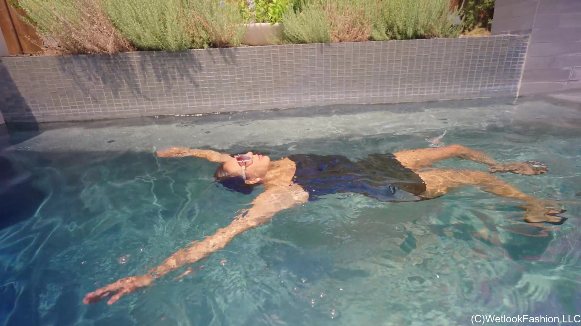 Selina Gets in the Pool a  Little Black Satin Dress
