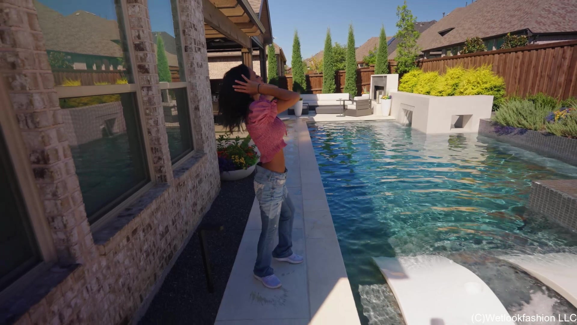 Charlie Does Some Pool Dipping in Jeans and Crop Top