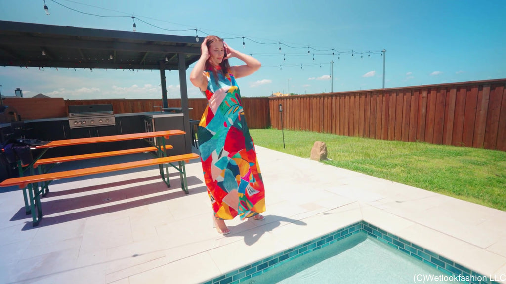 Taylor Falls in the Pool Wearing a Colorful Maxi Dress