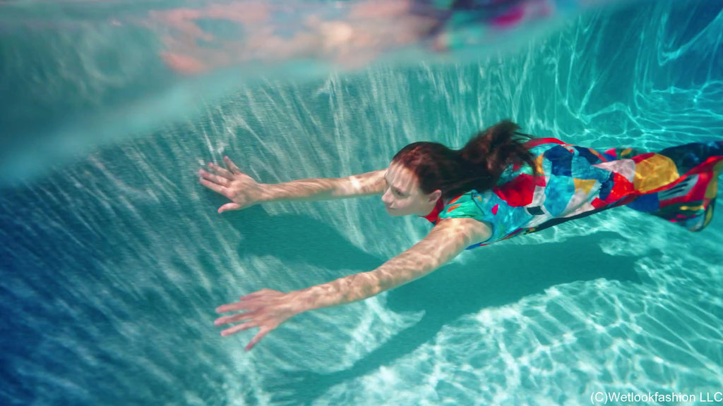 Taylor Falls in the Pool Wearing a Colorful Maxi Dress