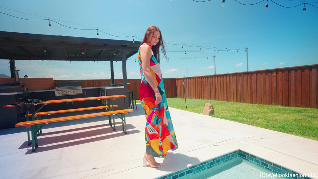 Taylor Falls in the Pool Wearing a Colorful Maxi Dress