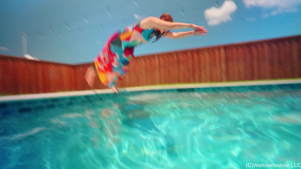 Taylor Falls in the Pool Wearing a Colorful Maxi Dress