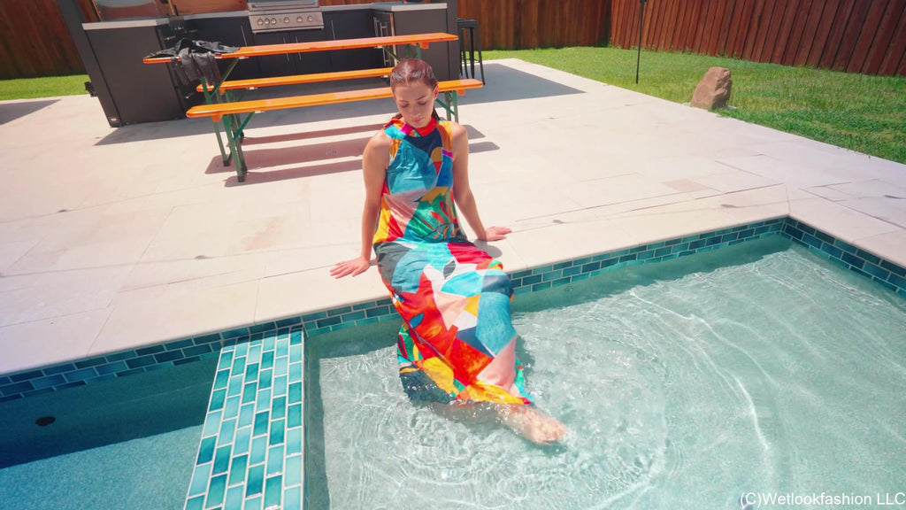 Taylor Falls in the Pool Wearing a Colorful Maxi Dress