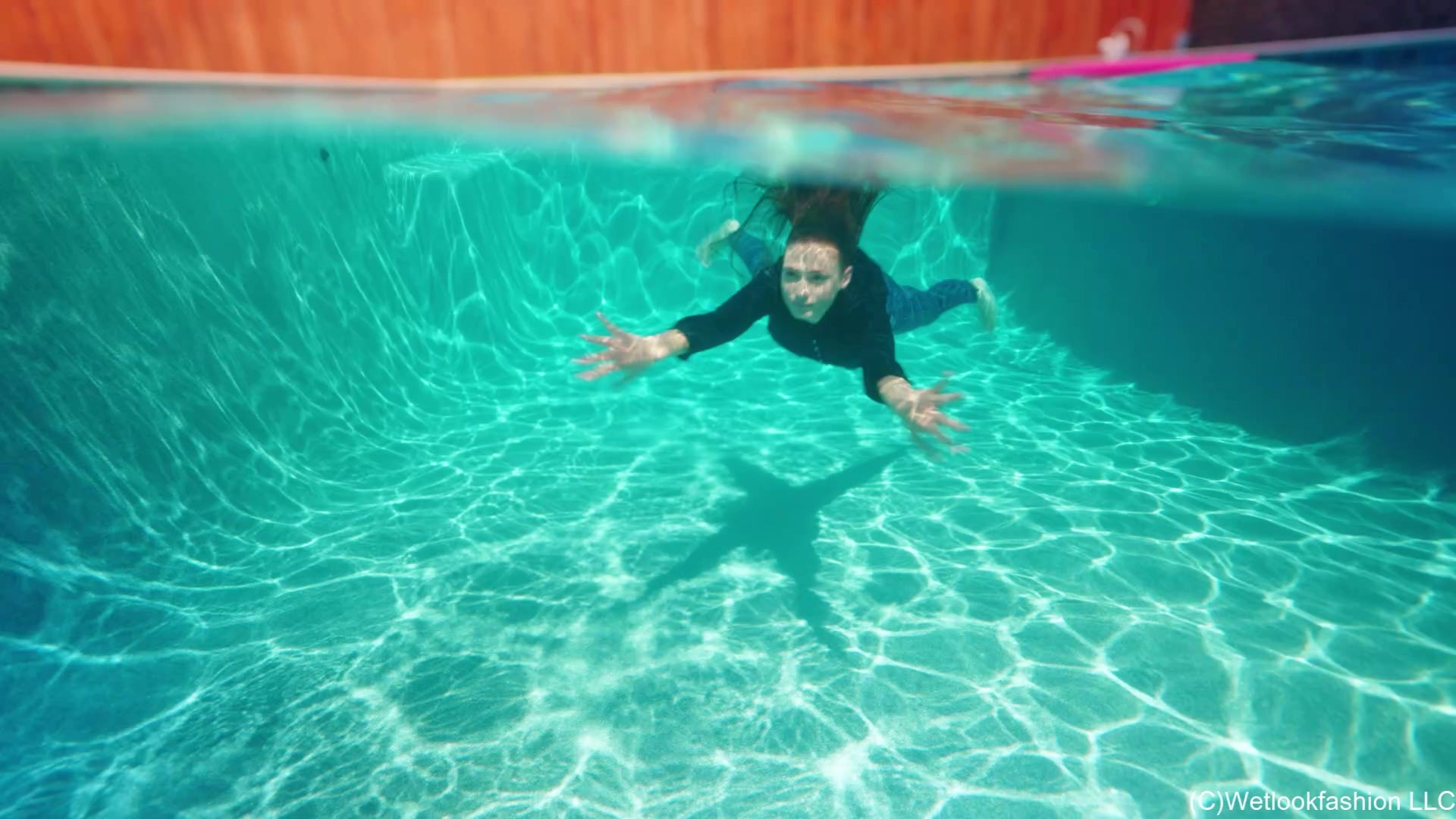 Taylor Swims in Jeans and Boots