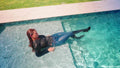 Taylor Swims in Jeans and Boots