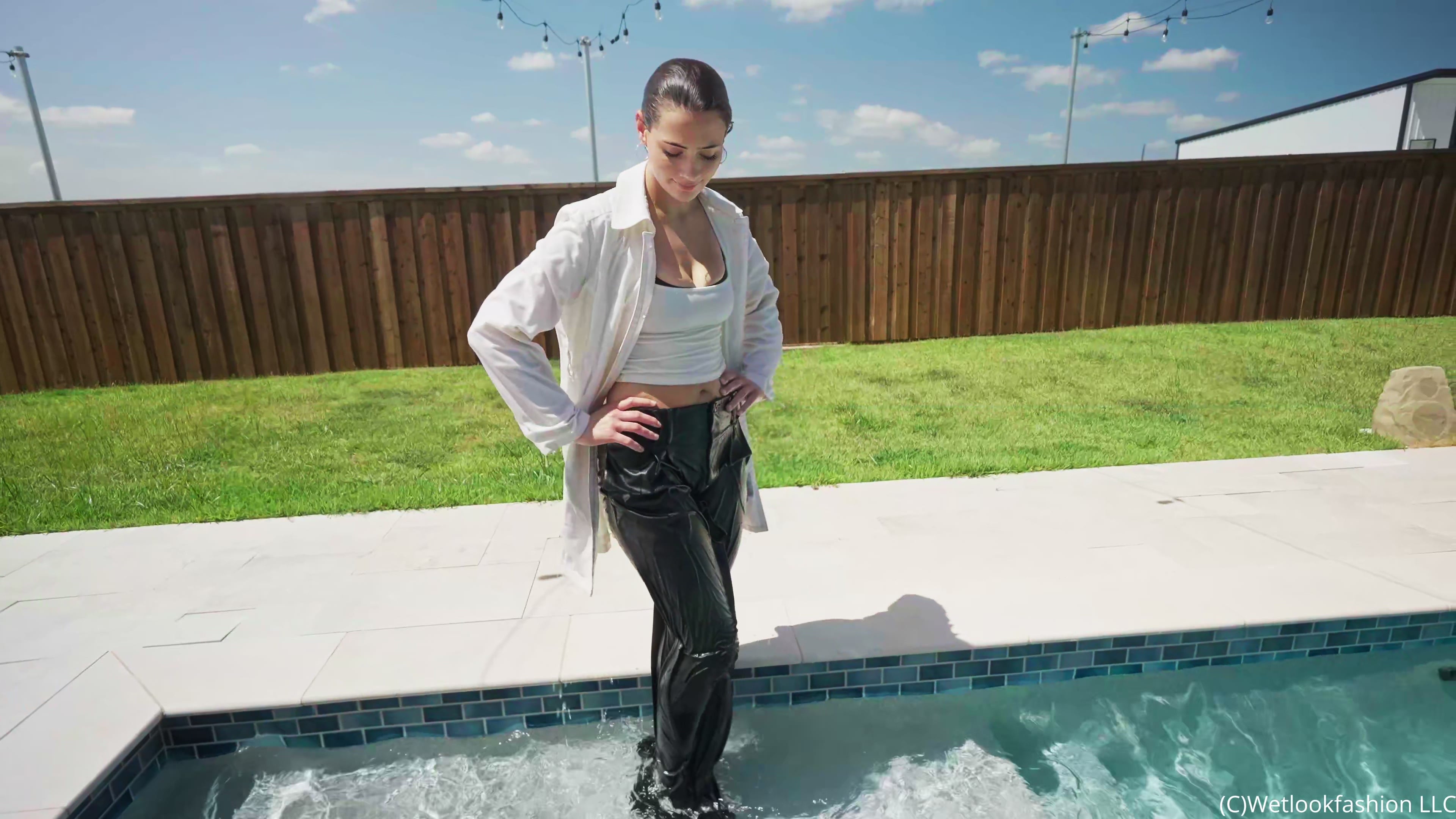Taylor Takes a Pool Dip in Leather Pants and a Coat